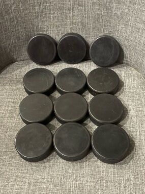 Ice Hockey Pucks Lot of 12 Brand New